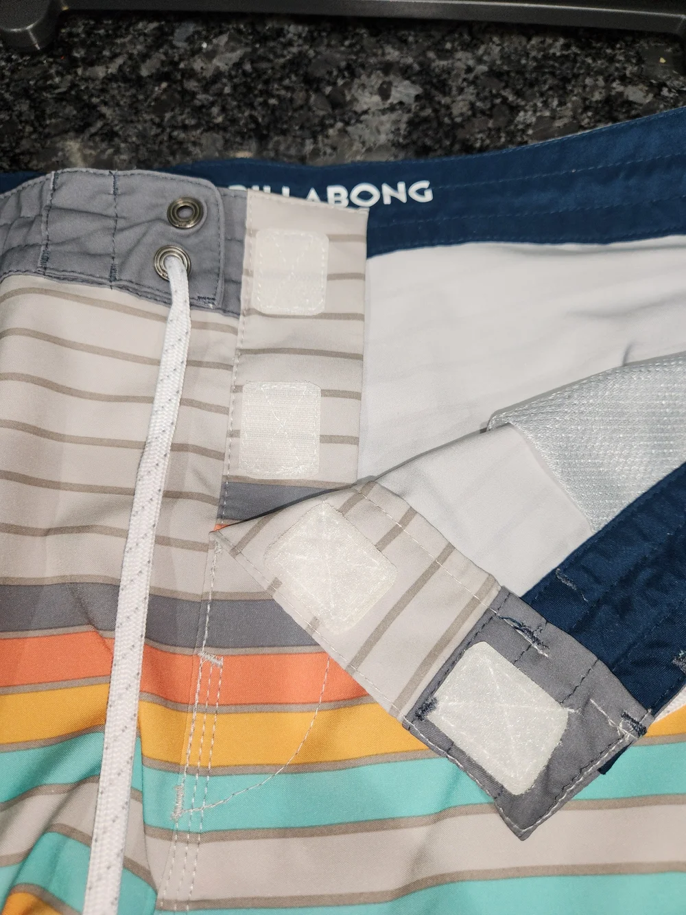 Billabong Men's Beige Swim Board Shorts with Orange & Teal Stripes